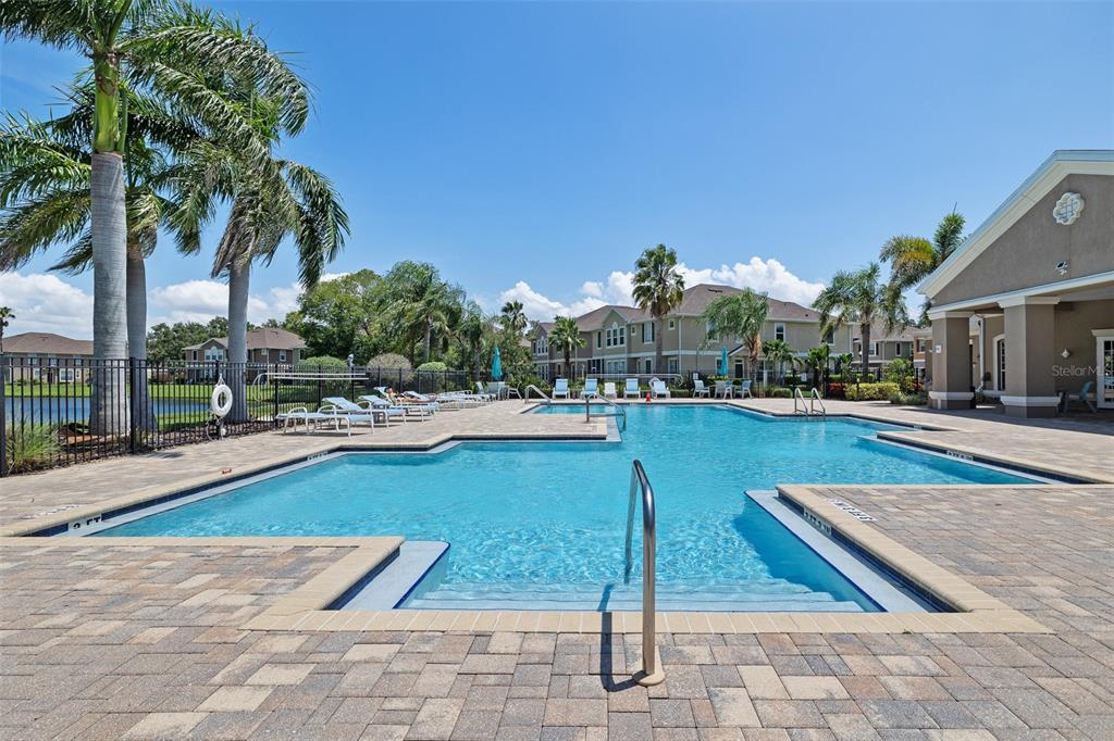 7001 Interbay Boulevard, Unit 303 Tampa, FL 33616 - Photo 31 of 37 a view of swimming pool with chairs