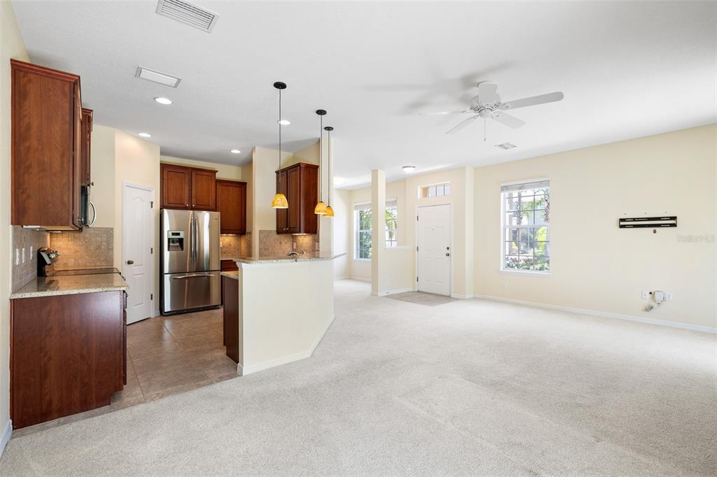 7001 Interbay Boulevard, Unit 303 Tampa, FL 33616 - Photo 10 of 37 a view of a kitchen with refrigerator and a sink