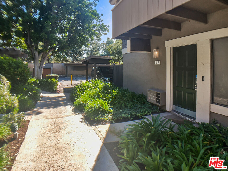 99 Streamwood Irvine, CA 92620 - Photo 7 of 12 a view of a backyard of the house