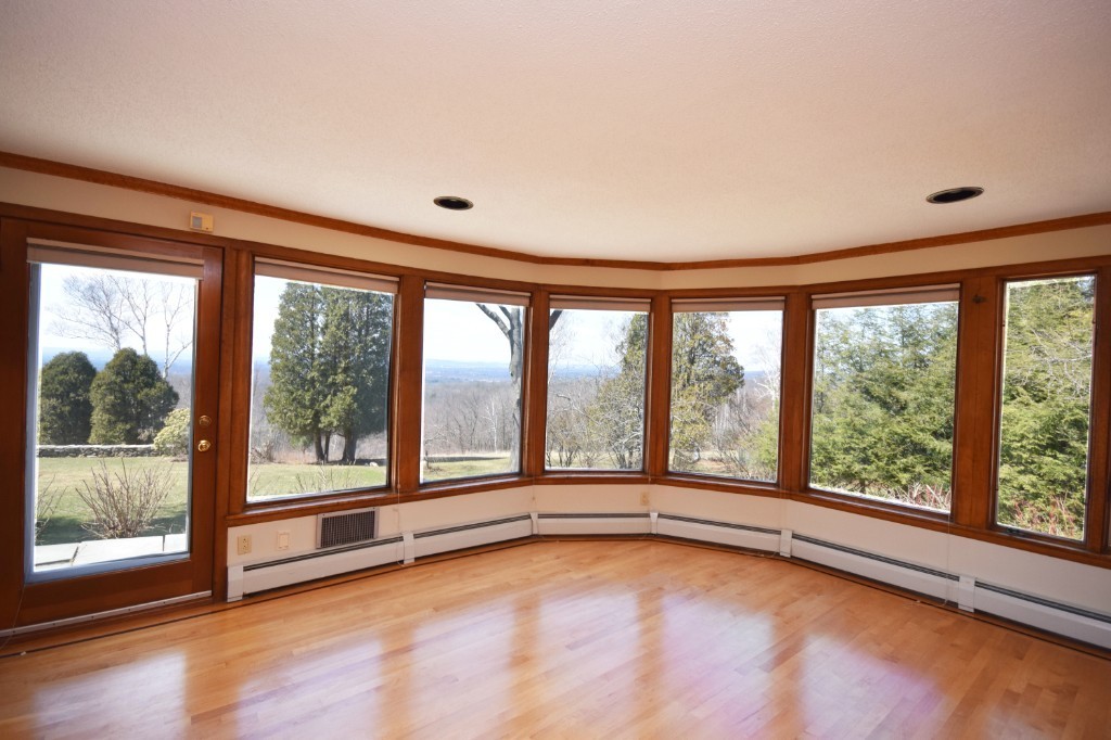 575 Ridge Road Wilbraham, MA 01095 - Photo 12 of 30 a view of an empty room with a large window