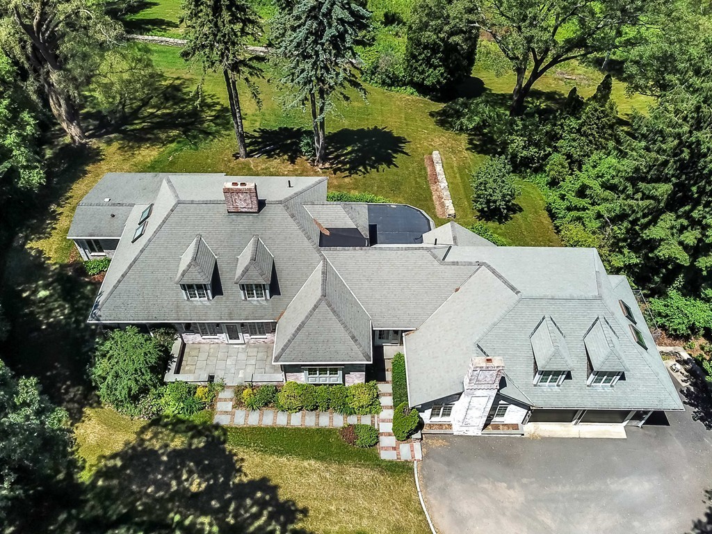 575 Ridge Road Wilbraham, MA 01095 - Photo 27 of 30 an aerial view of a house with swimming pool and large trees