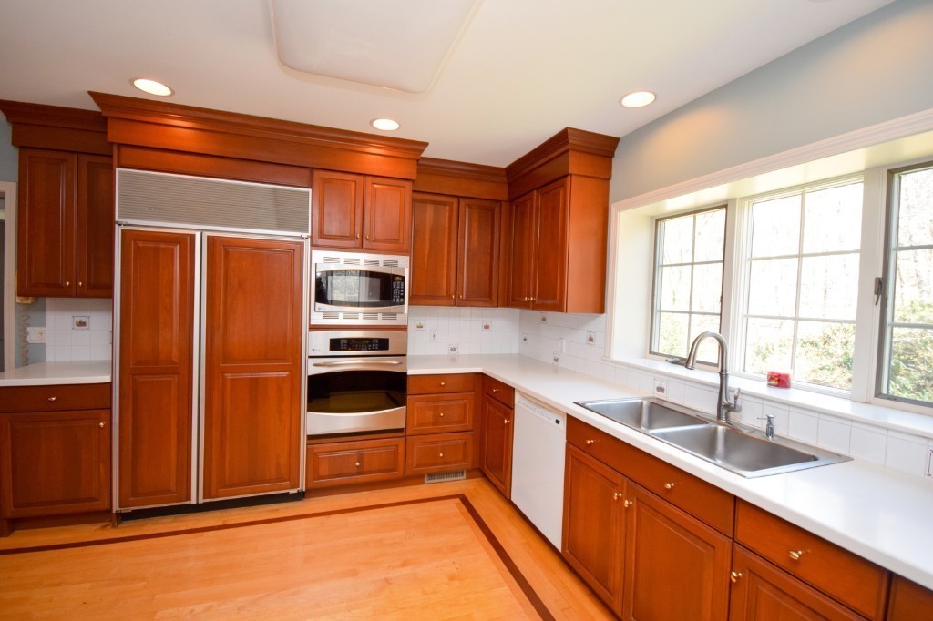 575 Ridge Road Wilbraham, MA 01095 - Photo 6 of 30 a kitchen with a sink and a refrigerator