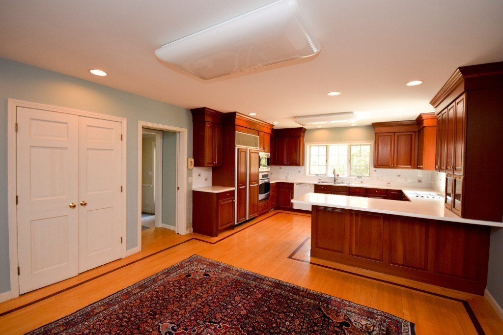 575 Ridge Road Wilbraham, MA 01095 - Photo 8 of 30 a kitchen with stainless steel appliances granite countertop a refrigerator and a stove top oven