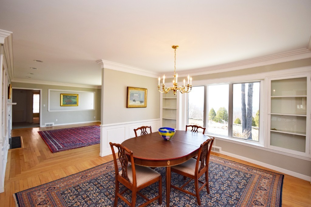 575 Ridge Road Wilbraham, MA 01095 - Photo 9 of 30 a view of a dining room with furniture window and wooden floor