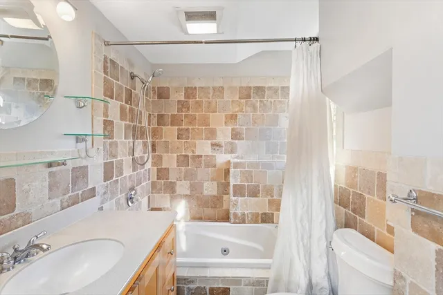 a bathroom with a sink and a bathtub