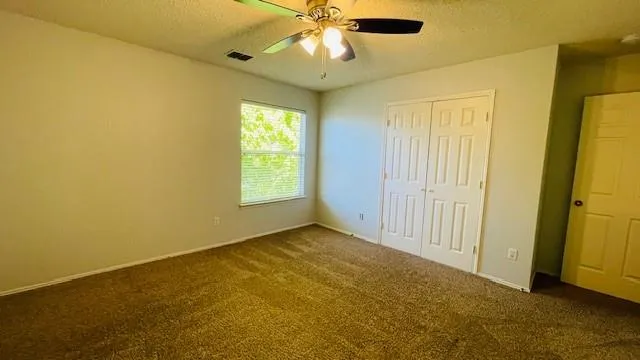 a view of walk in closet with window