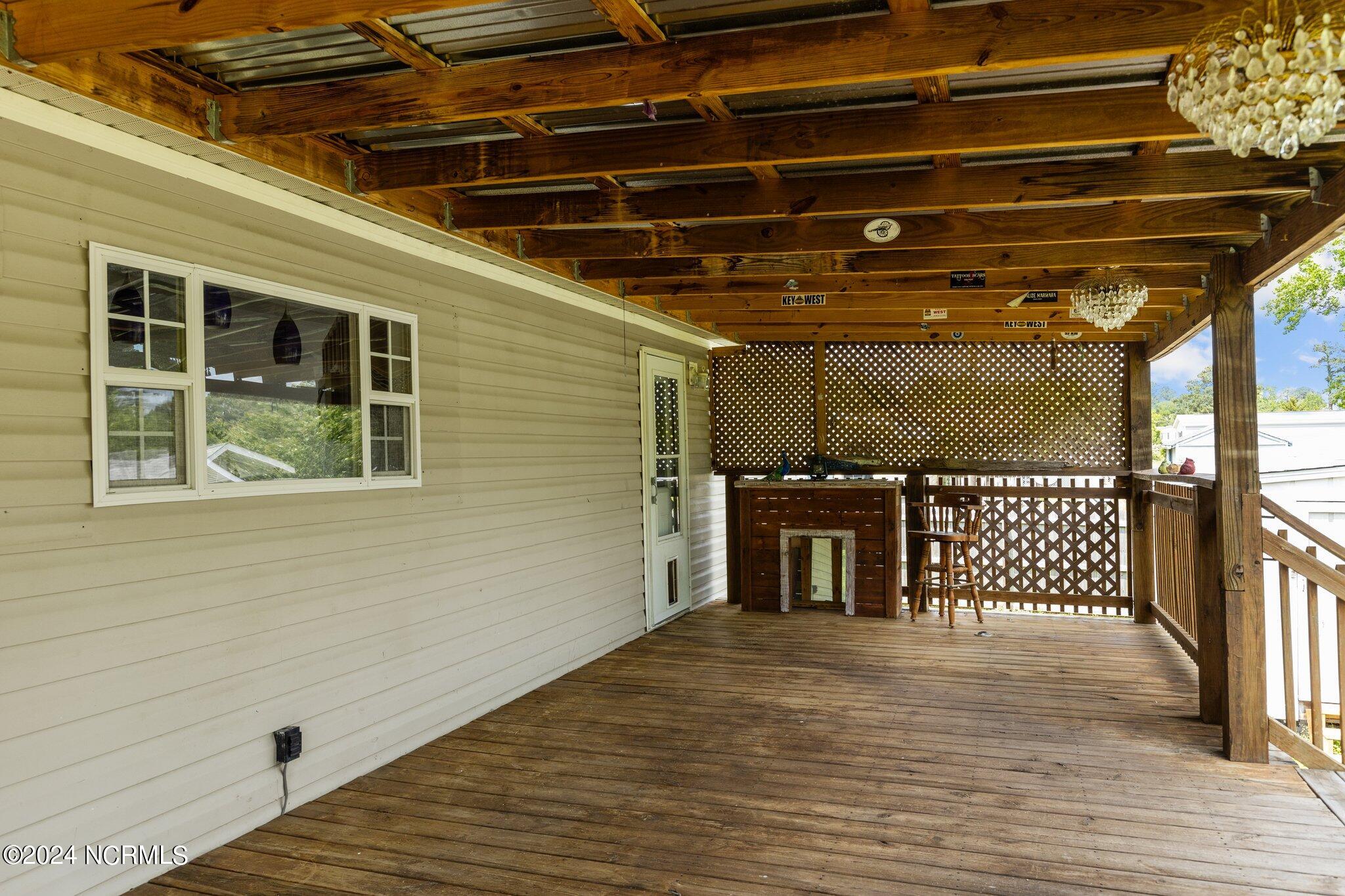 263 Hilltop Road Newport, NC 28570 - Photo 48 of 52 Back Porch 12' deep