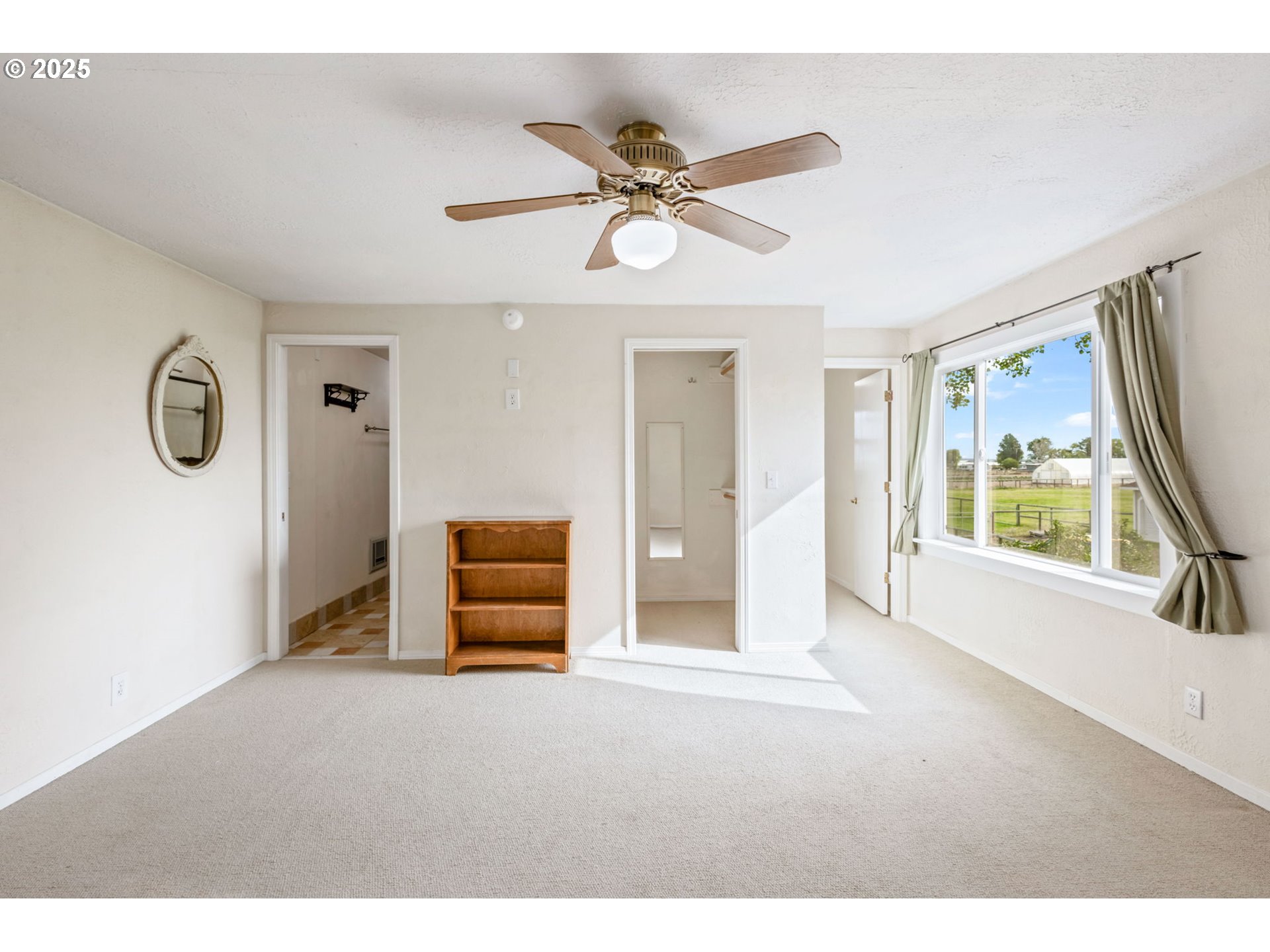 26315 Walker Road Bend, OR 97701 - Photo 11 of 45 a view of an empty room with a window