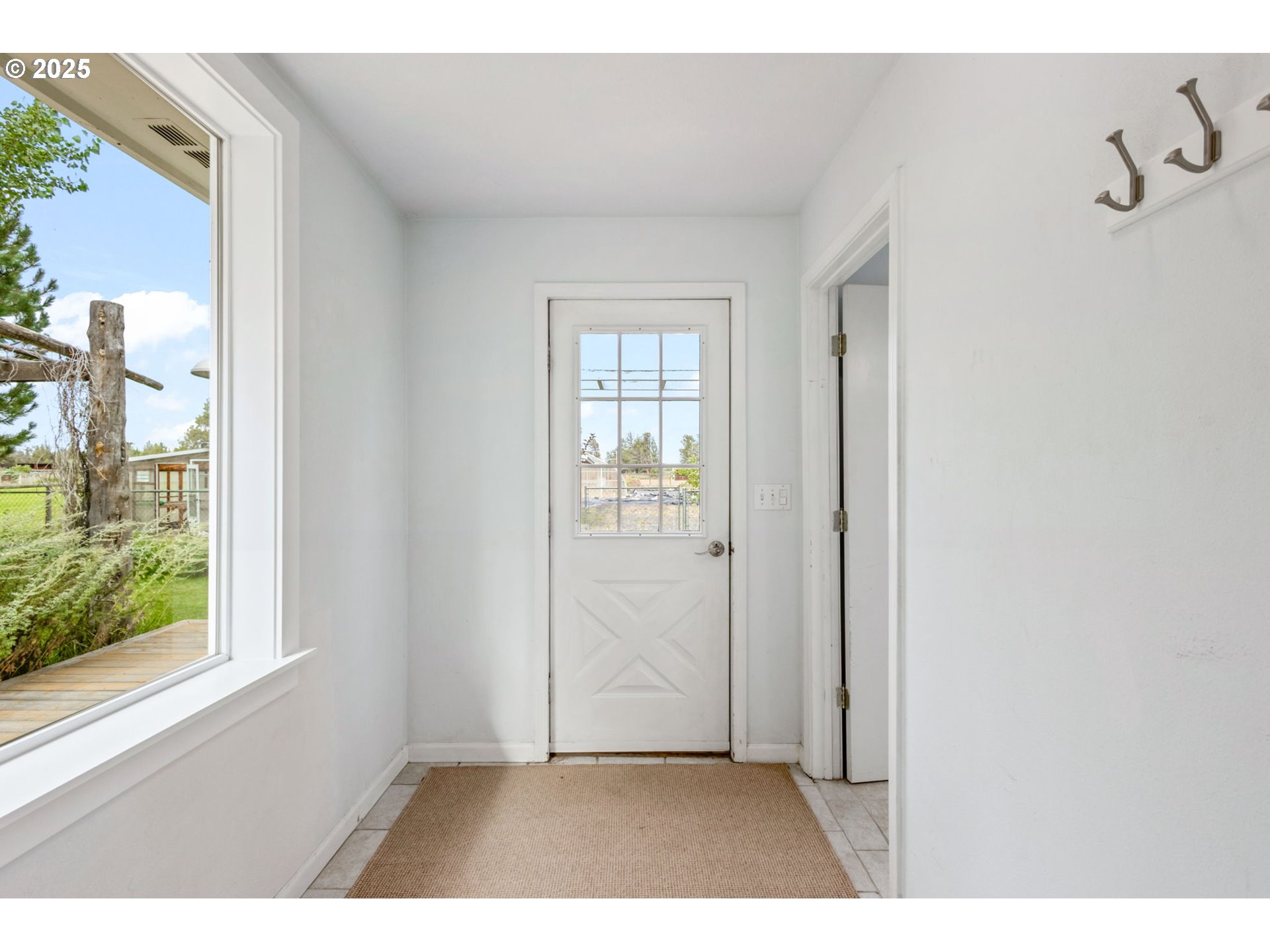 26315 Walker Road Bend, OR 97701 - Photo 20 of 45 a view interior of a house and an entryway with wooden floor