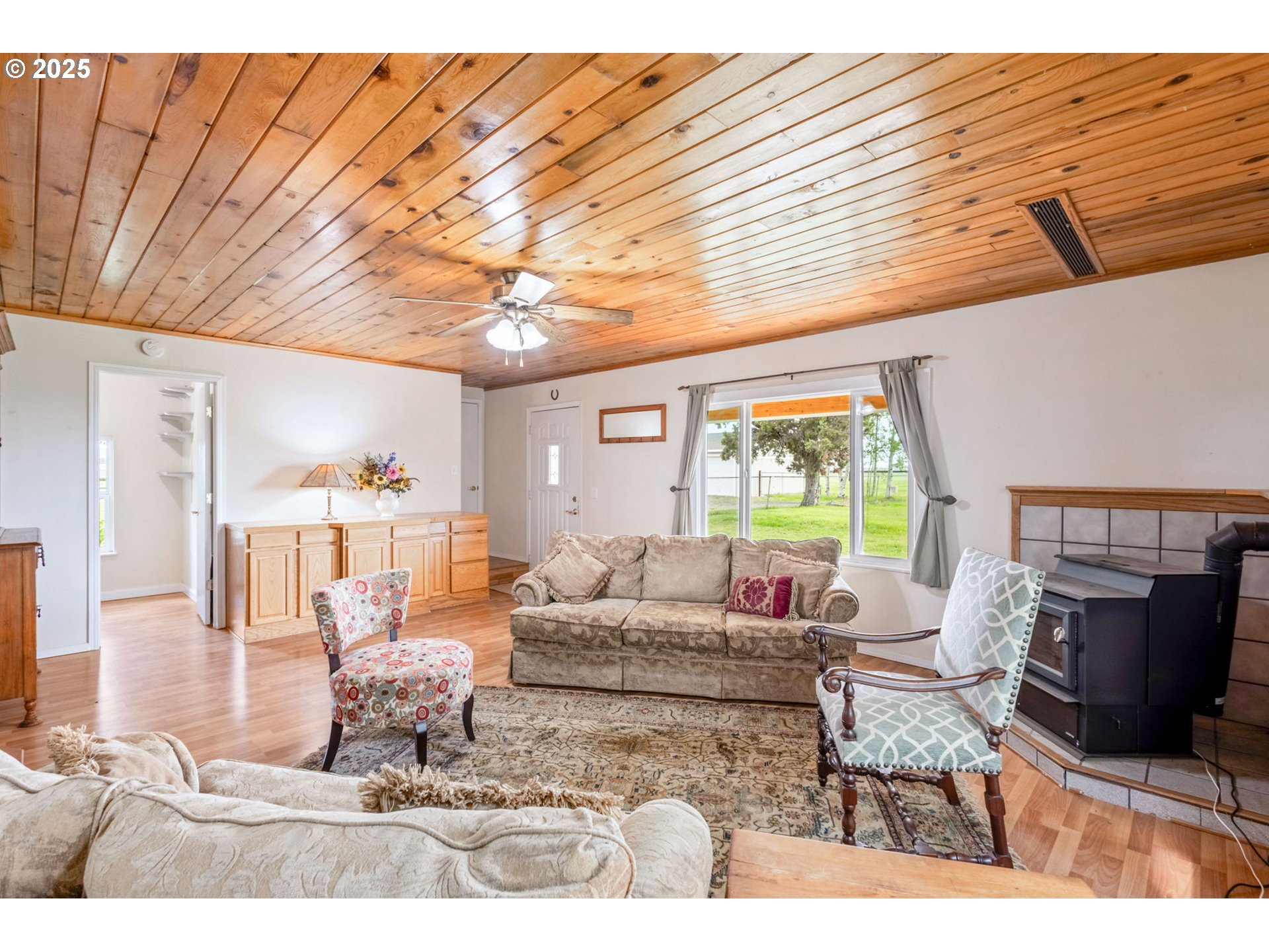26315 Walker Road Bend, OR 97701 - Photo 2 of 45 a living room with furniture and a flat screen tv