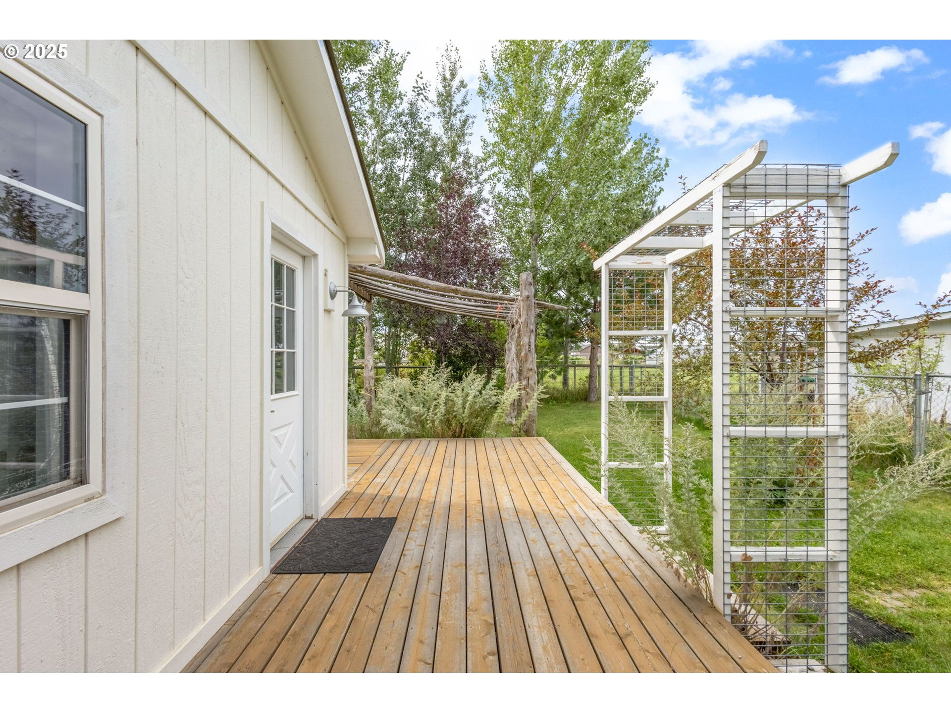 26315 Walker Road Bend, OR 97701 - Photo 22 of 45 a view of balcony with wooden floor