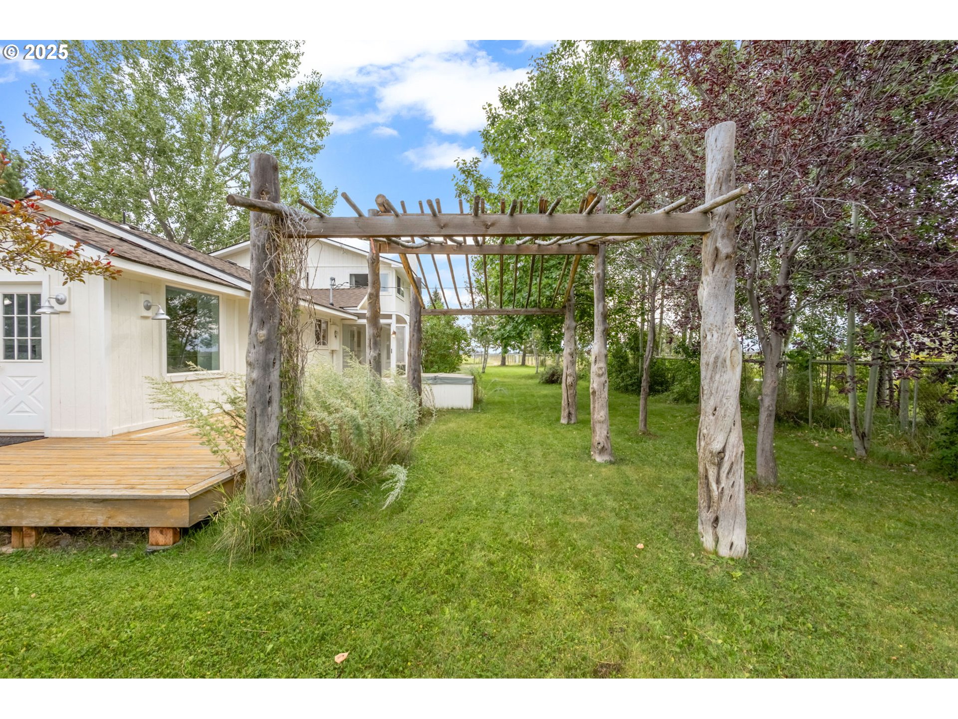 26315 Walker Road Bend, OR 97701 - Photo 25 of 45 a view of a house with a backyard