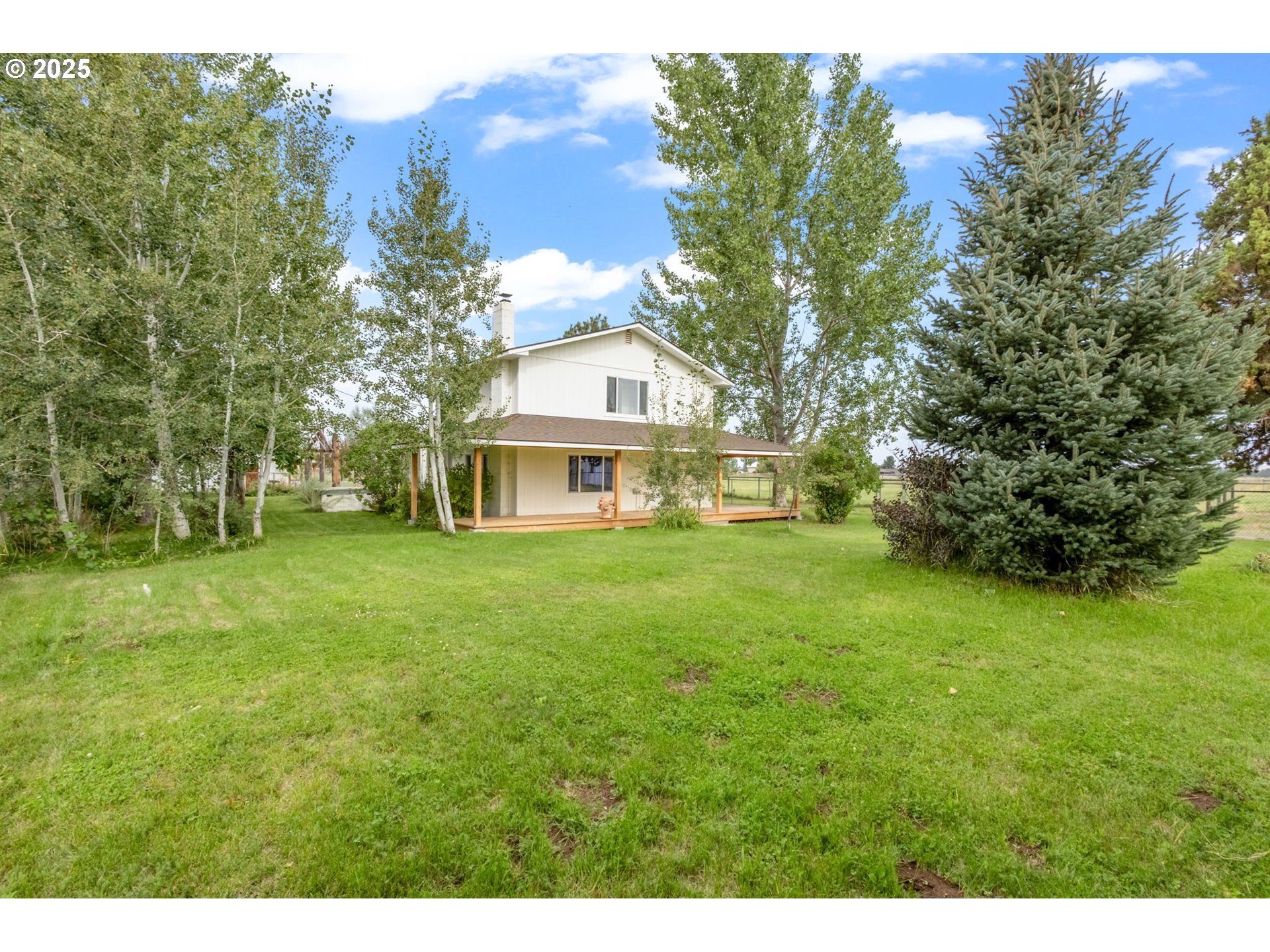 26315 Walker Road Bend, OR 97701 - Photo 27 of 45 a front view of a house with a yard