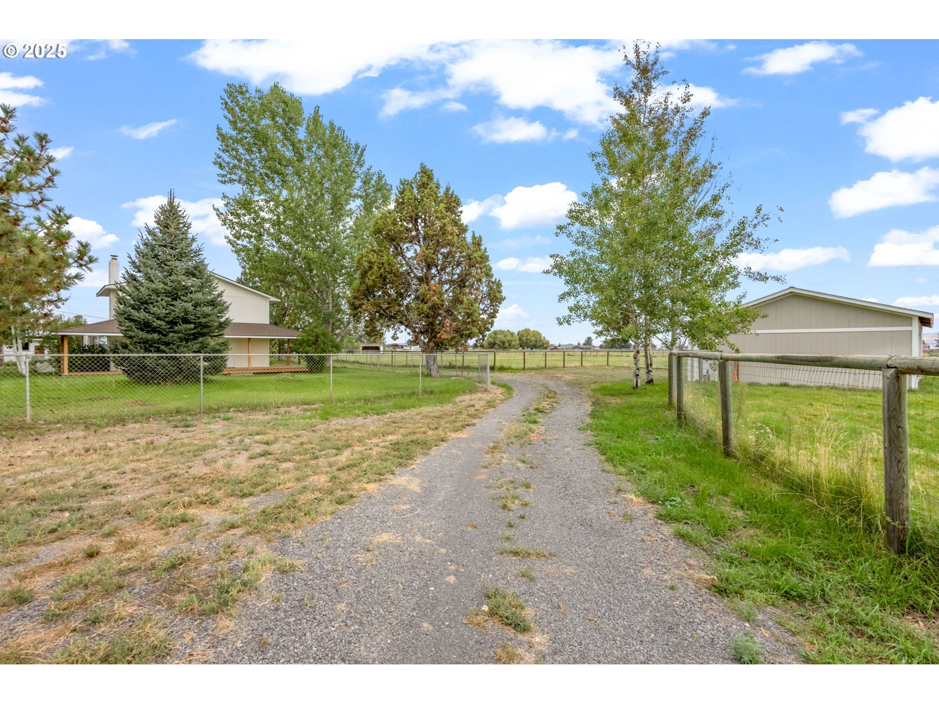 26315 Walker Road Bend, OR 97701 - Photo 29 of 45 a view of a park with large trees