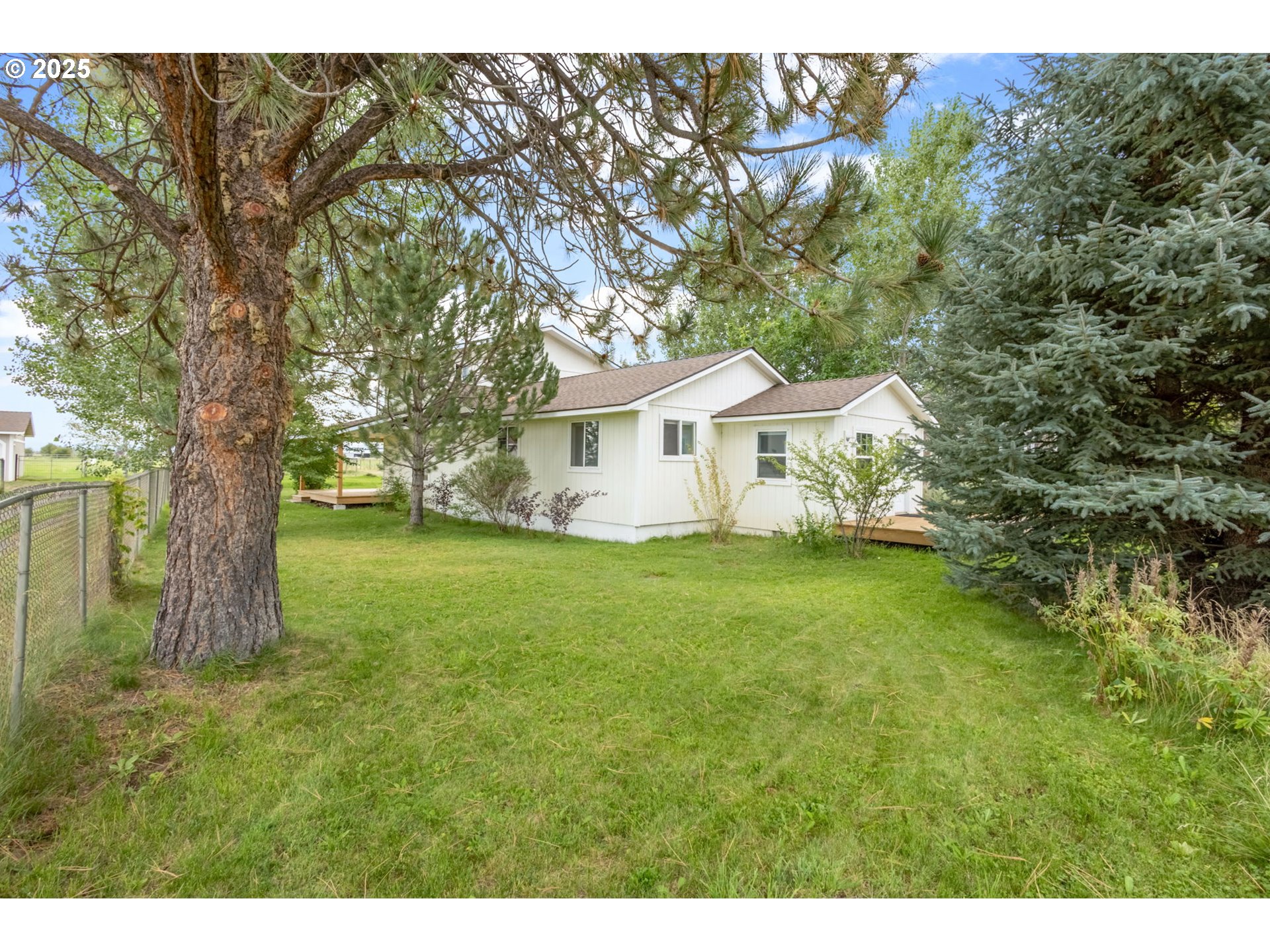 26315 Walker Road Bend, OR 97701 - Photo 30 of 45 a view of house with a yard