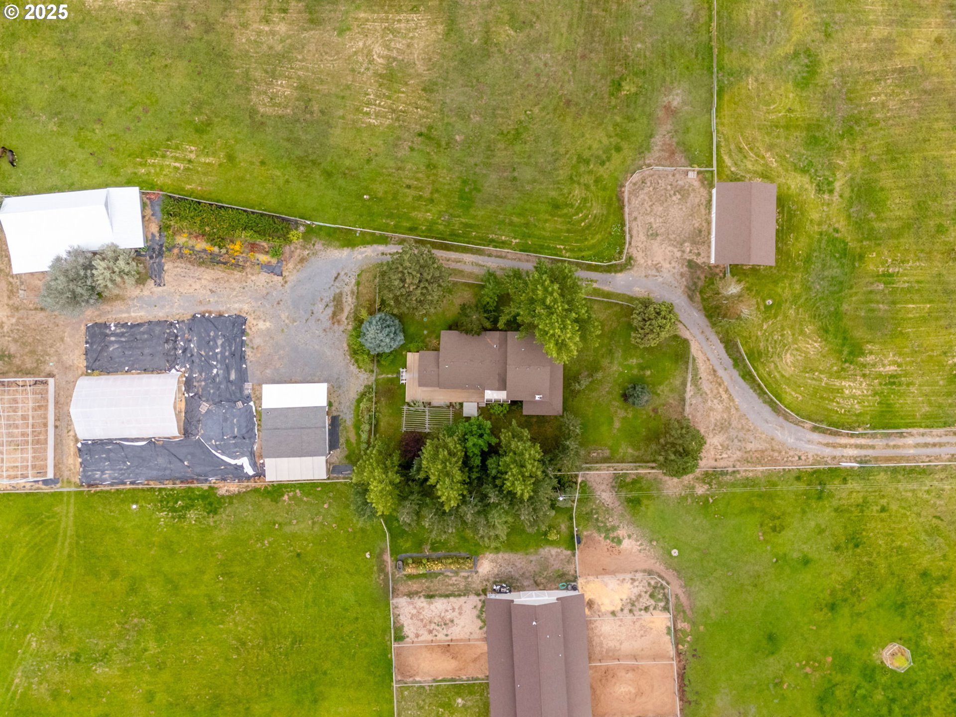 26315 Walker Road Bend, OR 97701 - Photo 45 of 45 an aerial view of residential houses with outdoor space and swimming pool