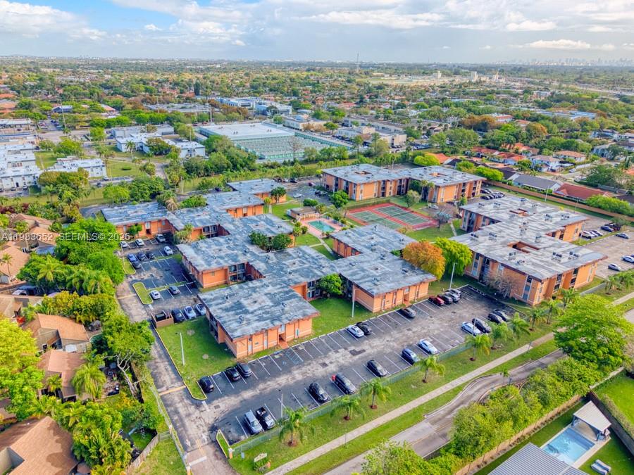 9459 Southwest 76th Street, Unit R5 Miami, FL 33173 - Photo 29 of 33 an aerial view of a city