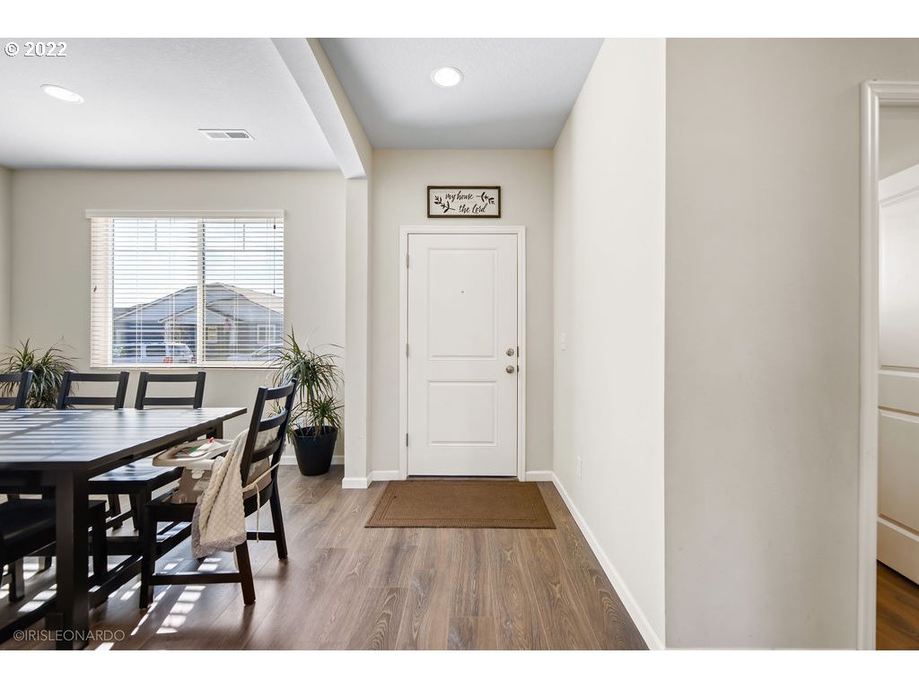2700 South Red Tail Loop Ridgefield, WA 98642 - Photo 10 of 24 a view of a dining room with furniture and wooden floor