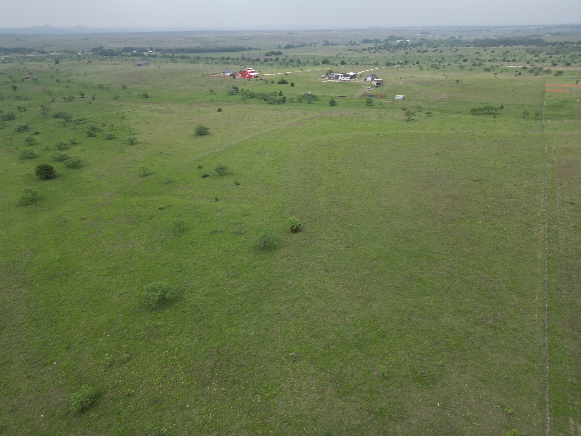 2332 County Road 2109 Lometa, TX 76853 - Photo 4 of 16 a view of a field with trees in the background