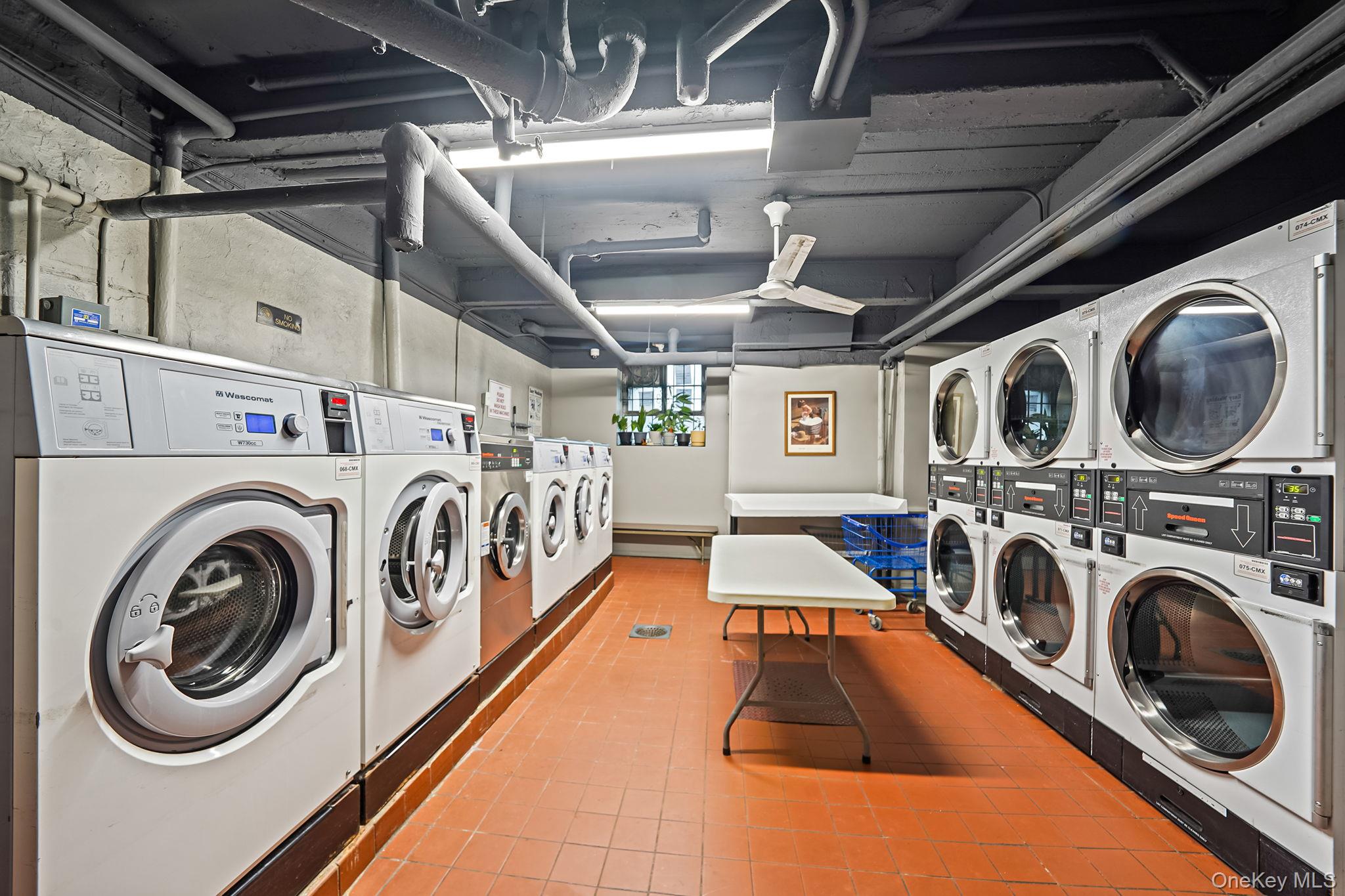 39-45 51st Street, Unit 5C Queens, NY 11377 - Photo 15 of 17 a utility room with dryer washer and other items