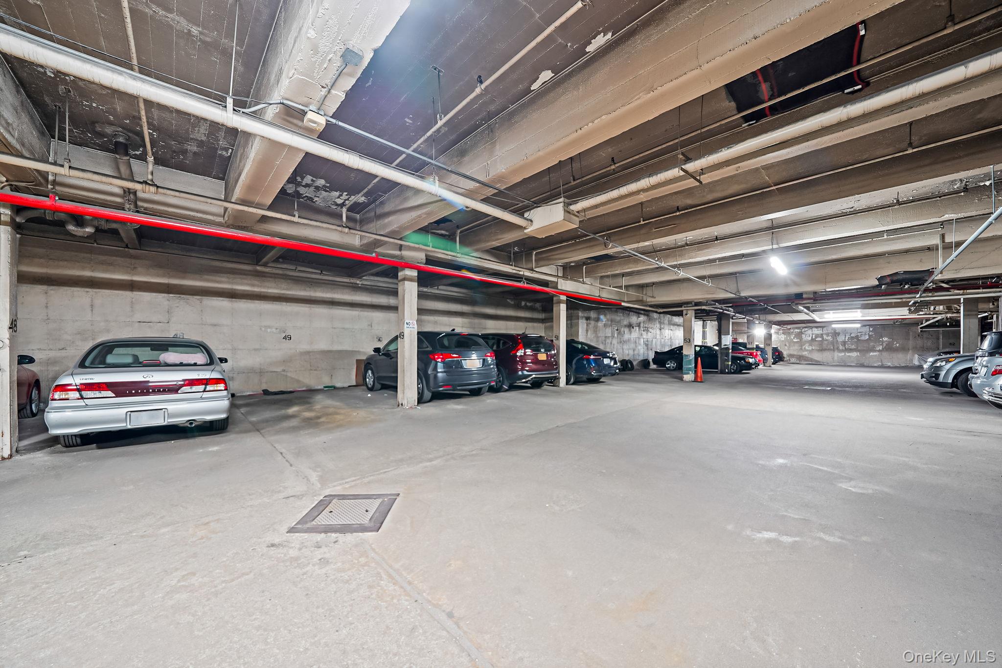 39-45 51st Street, Unit 5C Queens, NY 11377 - Photo 16 of 17 a car parked in garage