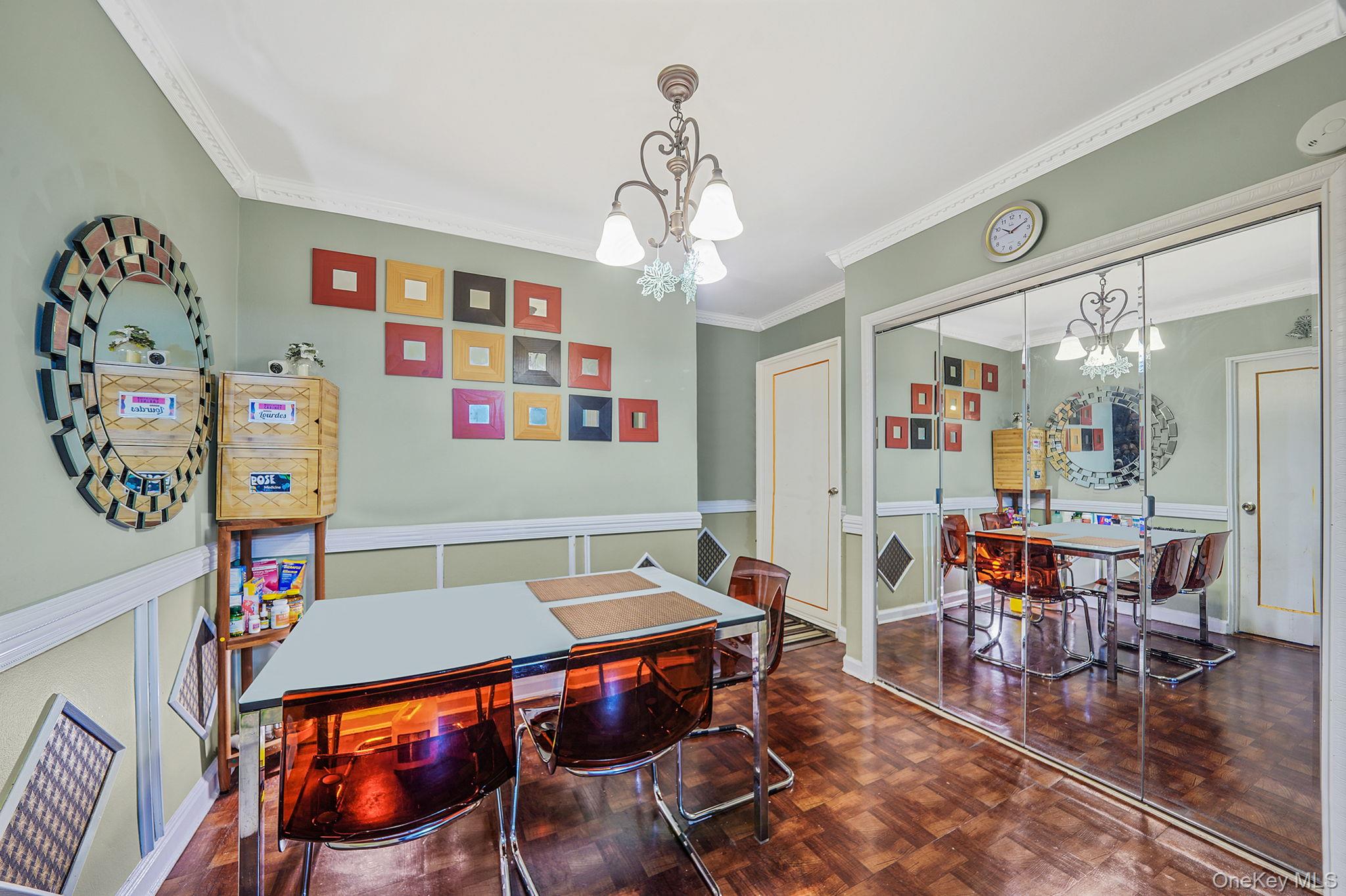 39-45 51st Street, Unit 5C Queens, NY 11377 - Photo 5 of 17 a view of a dining room with furniture and wooden floor