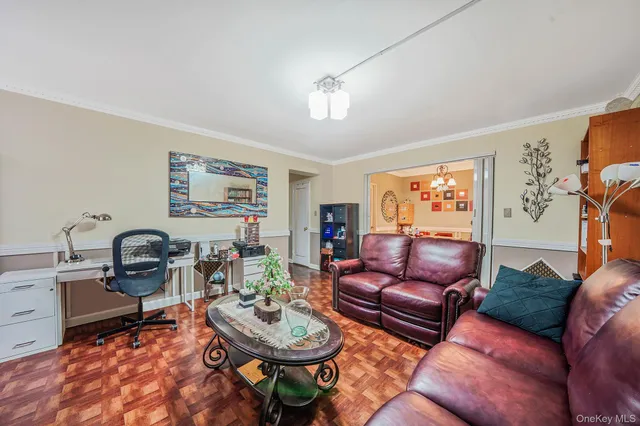 a living room with furniture a rug and a window