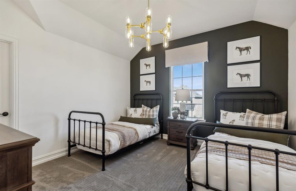 308 Brookhurst Road Little Elm, TX 75068 - Photo 14 of 19 Secondary bedroom designed with generous storage solutions *Model representation