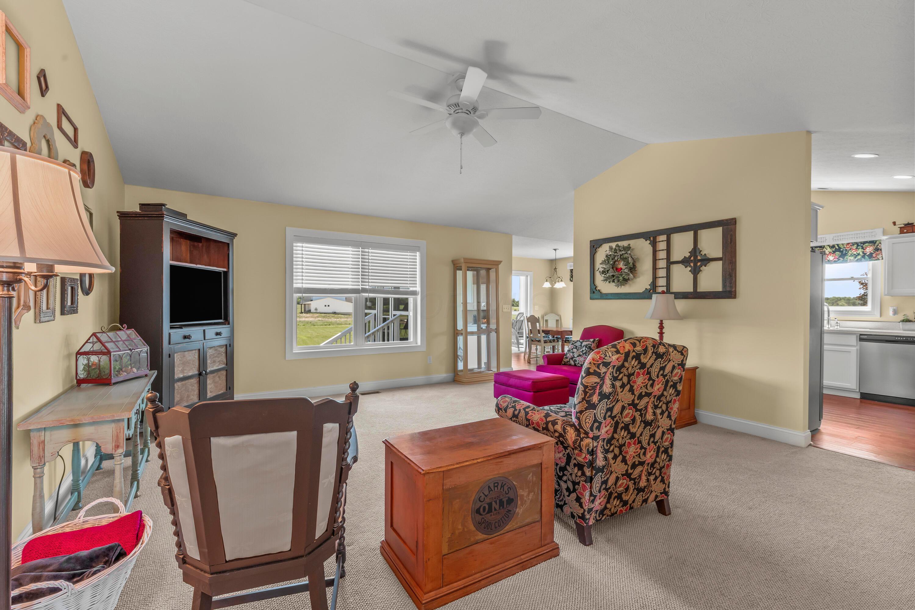 3582 Panhandle Road Delaware, OH 43015 - Photo 23 of 65 • Berber carpet • Tan painted walls • Lighted ceiling fan • Cathedral ceiling