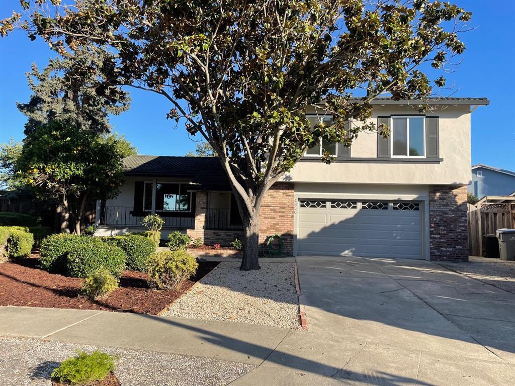 4856 Birmingham Drive San Jose, CA 95136 - Photo 1 of 16 a front view of a house with garden