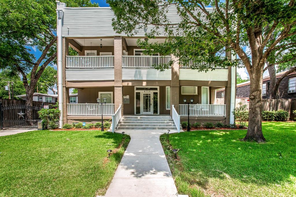 4719 Junius Street, Unit 1 Dallas, TX 75246 - Photo 1 of 40 front view of a house with a yard