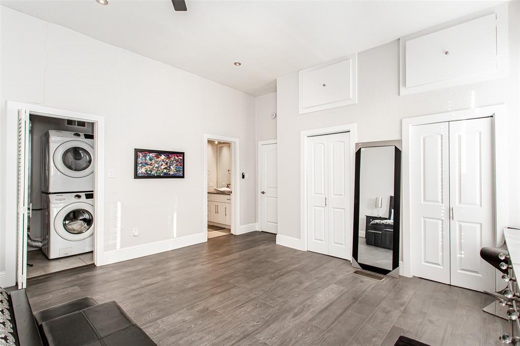 4719 Junius Street, Unit 1 Dallas, TX 75246 - Photo 29 of 40 a view of an empty room with closet and a window