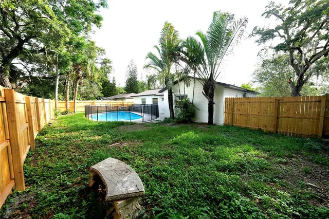 a view of a backyard with a garden