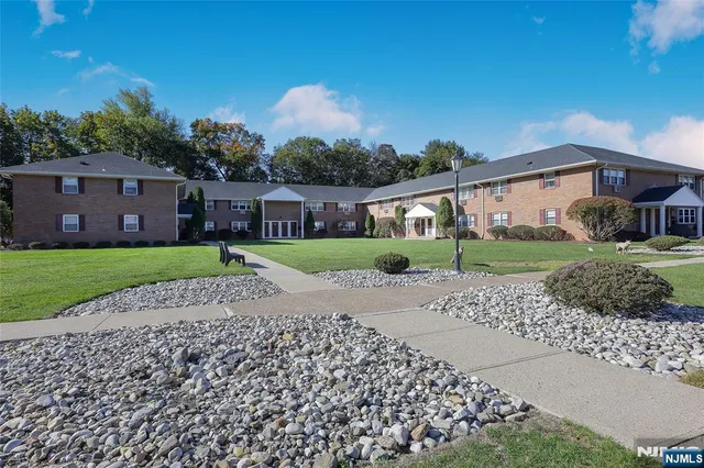a view of a front of house with a yard