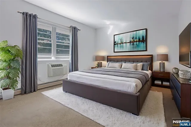 a view of an empty room and closet area