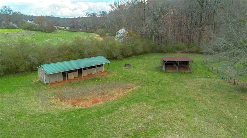 Lot 18 Bear Creek Road Statham, GA 30666 - Photo 12 of 21 a view of a chairs in a yard