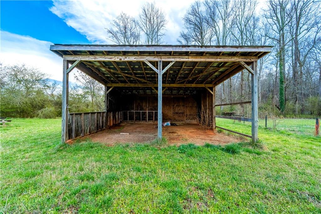 Lot 18 Bear Creek Road Statham, GA 30666 - Photo 16 of 21 a view of a backyard of a house