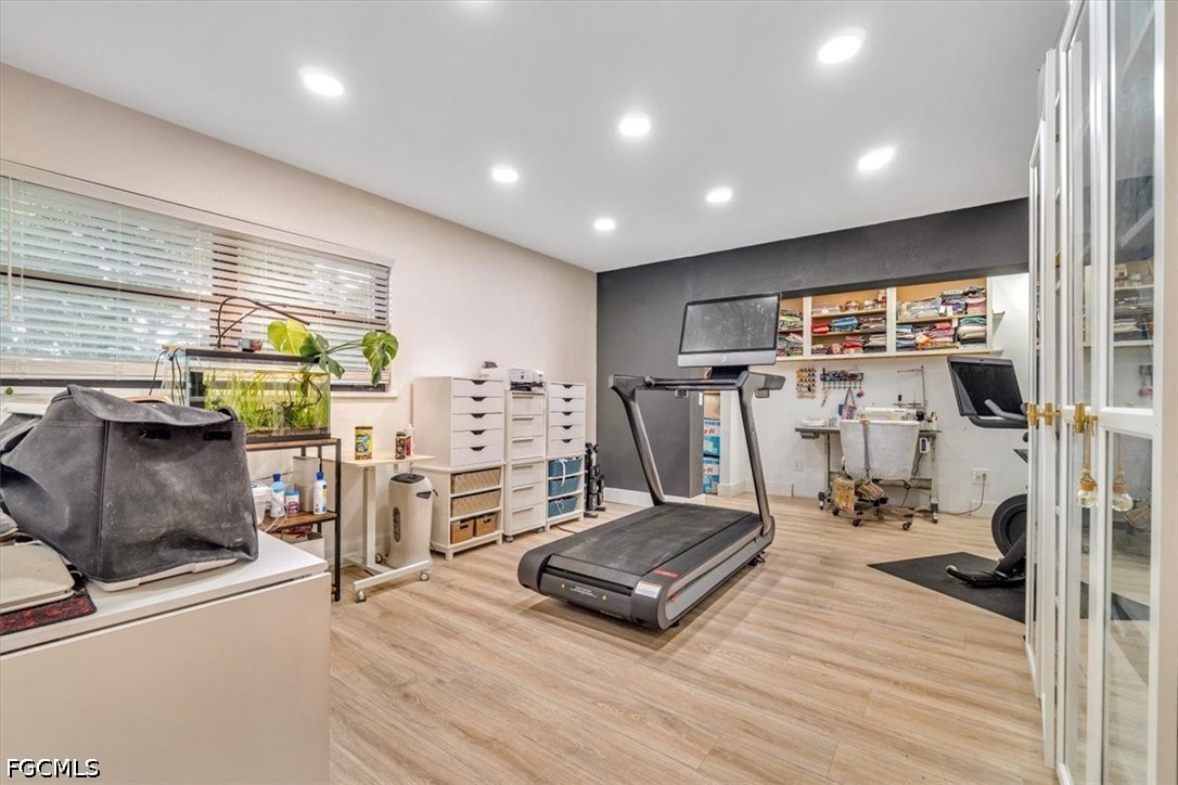 202 Ridgewood Avenue Clewiston, FL 33440 - Photo 38 of 50 a view of a room with gym equipment