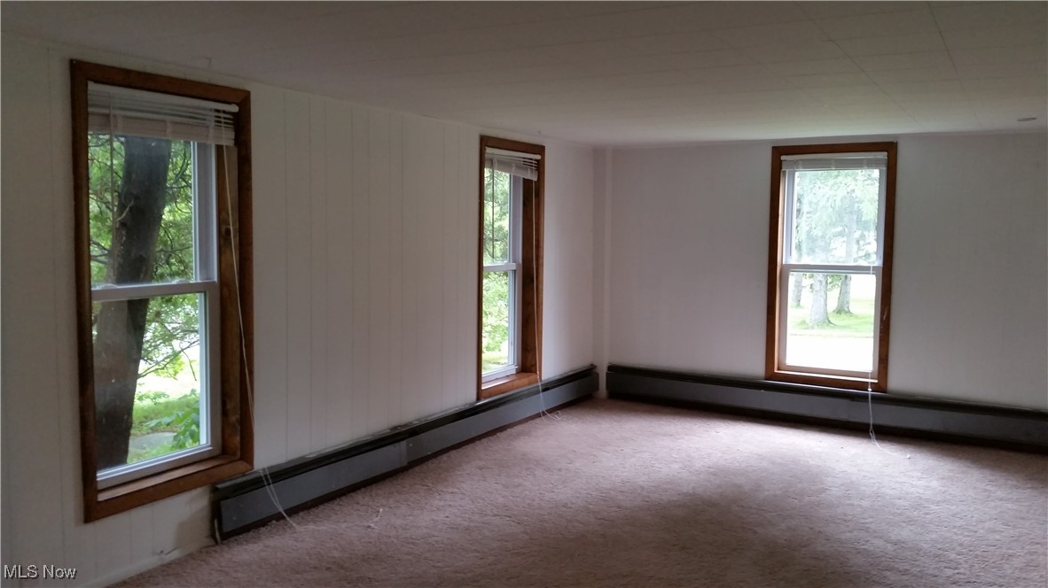 15401 A Madison Road Middlefield, OH 44062 - Photo 15 of 17 Carpet and natural light from windows