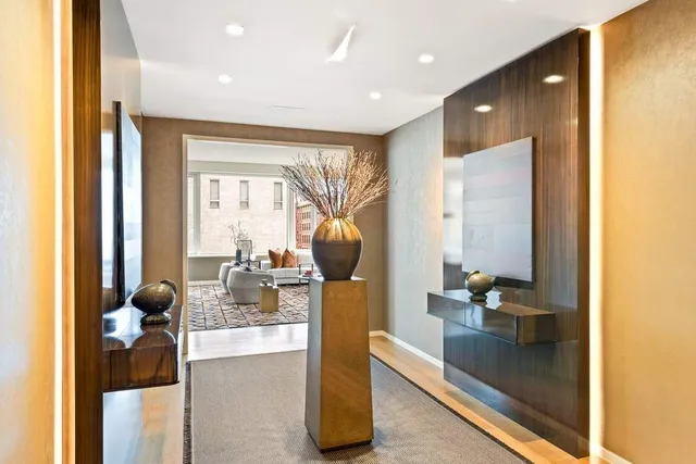 a view of kitchen with a sink and a refrigerator