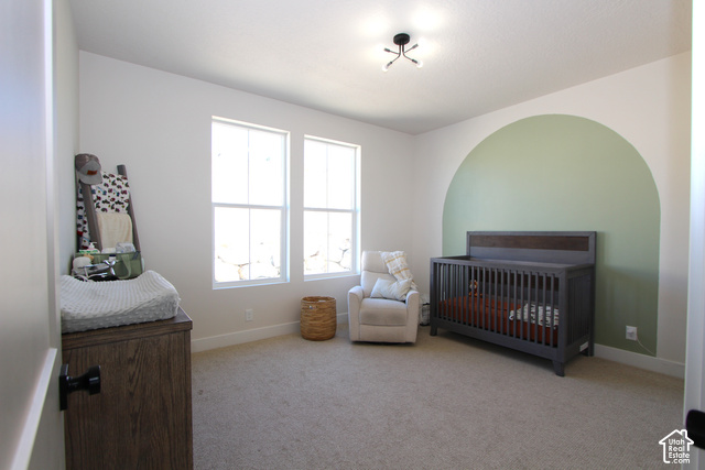 2201 East Unity Way Eagle Mountain, UT 84005 - Photo 22 of 39 Bright room featuring two windows, recessed ceiling light, and light-toned carpeting