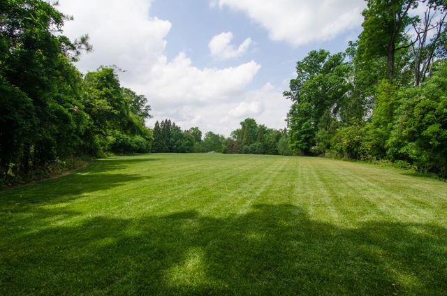 a view of a golf course with a garden