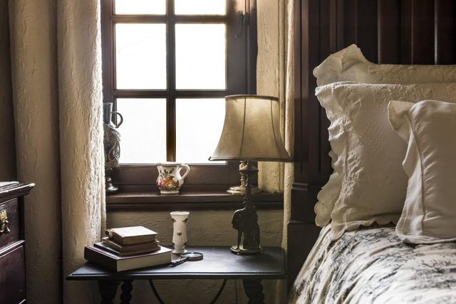 a view of a livingroom with furniture and a fireplace