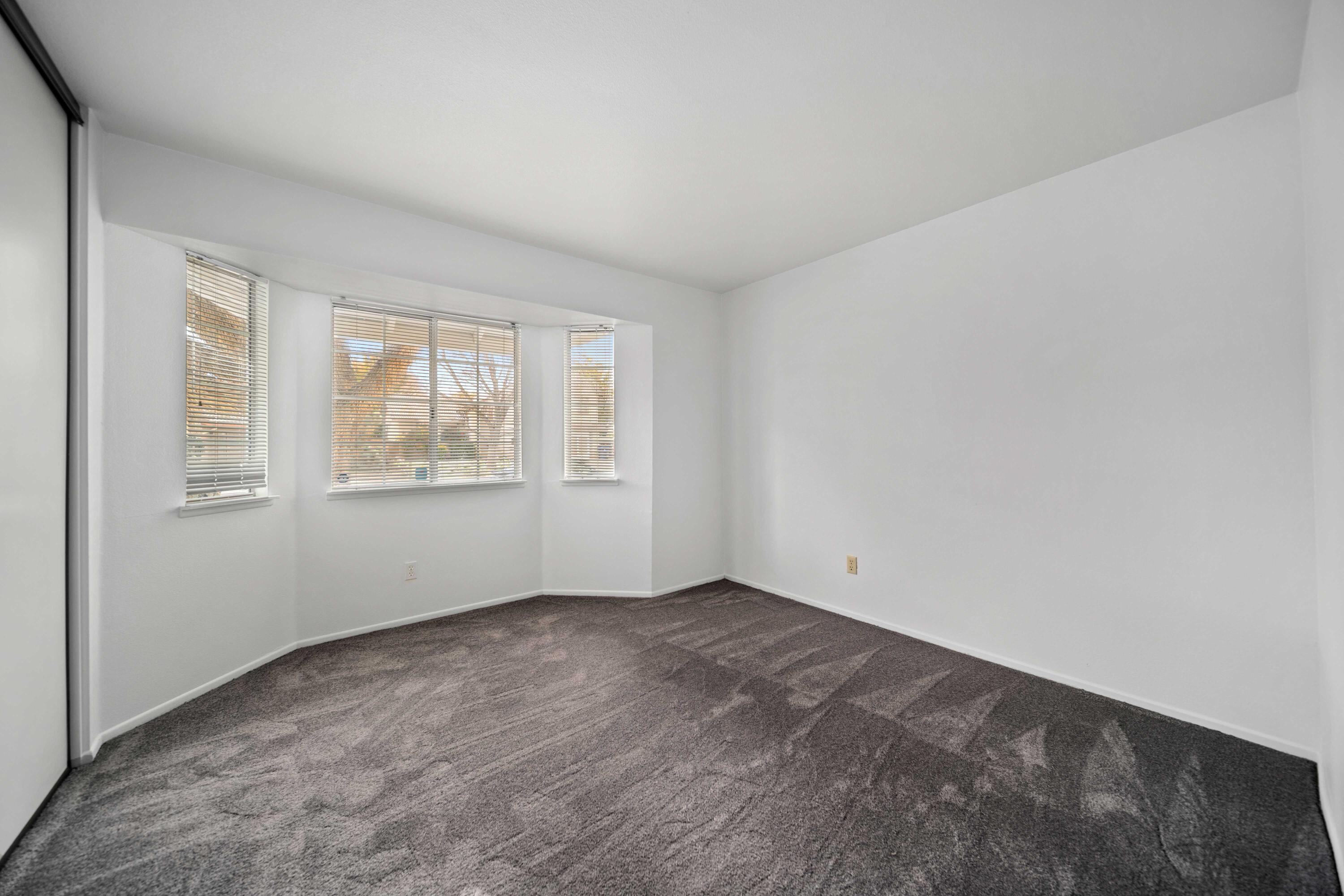 1247 Coventry Place Palmdale, CA 93551 - Photo 11 of 20 an empty room with windows