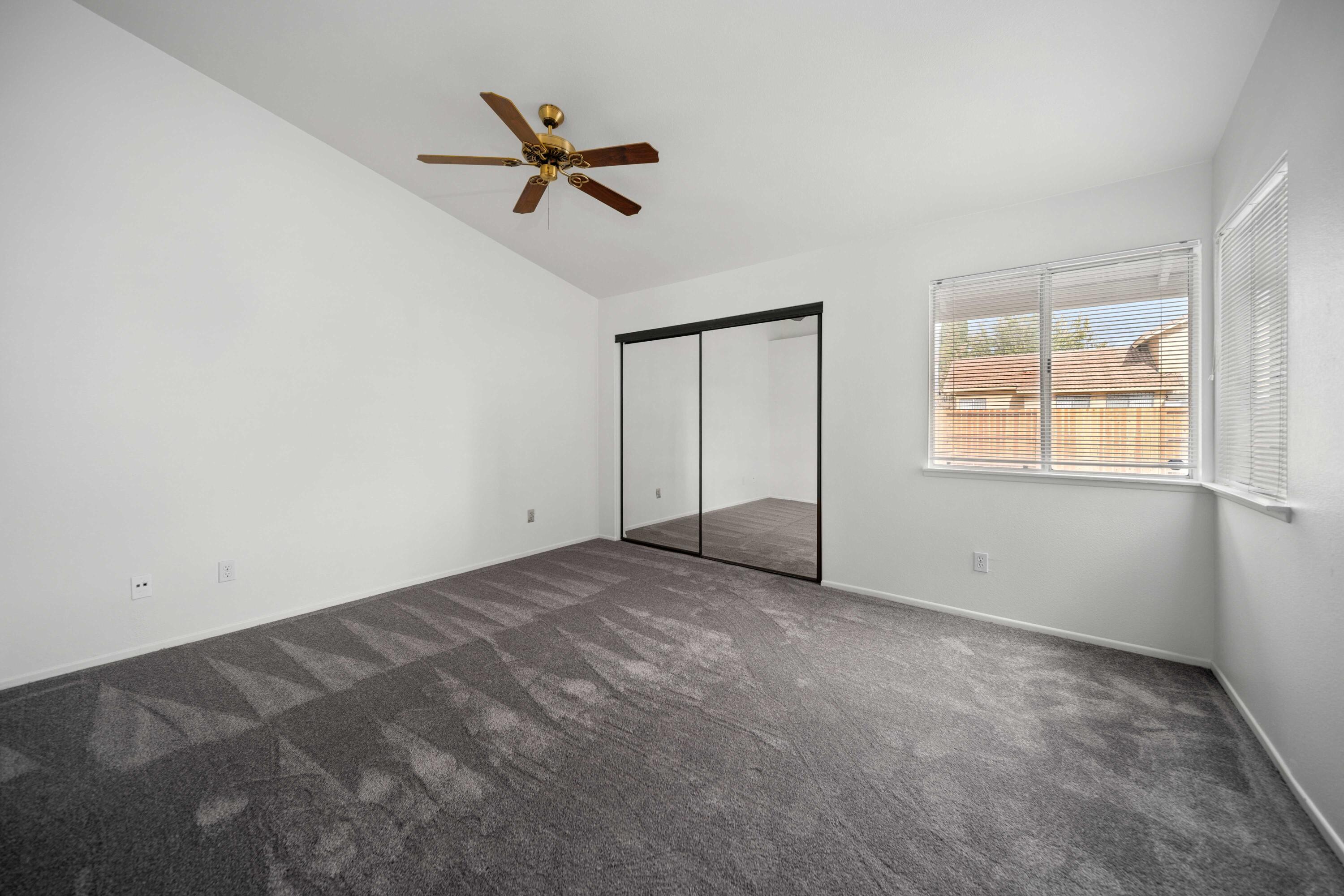 1247 Coventry Place Palmdale, CA 93551 - Photo 14 of 20 a view of empty room with windows