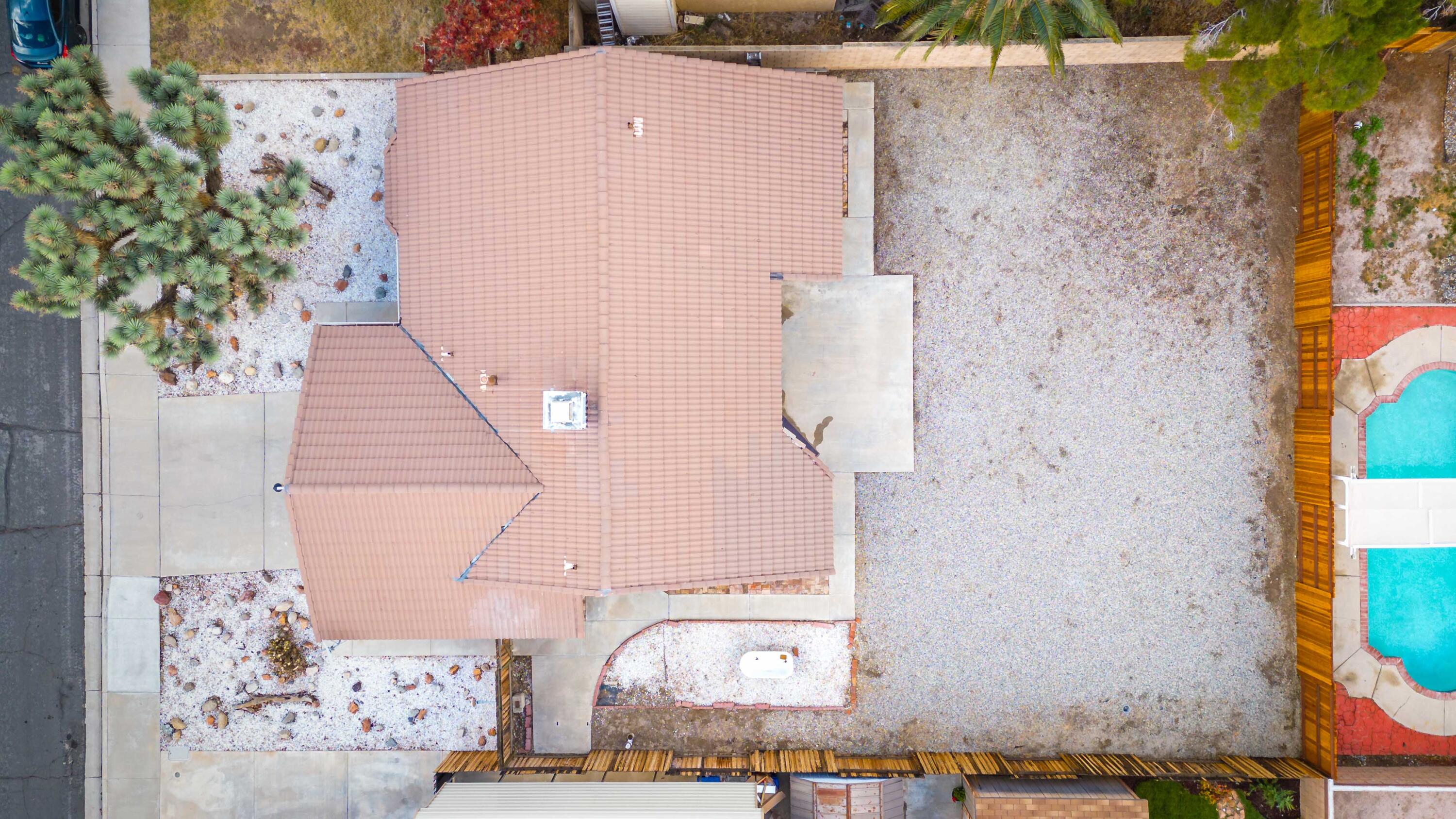 1247 Coventry Place Palmdale, CA 93551 - Photo 19 of 20 a aerial view of a house with a yard and large tree