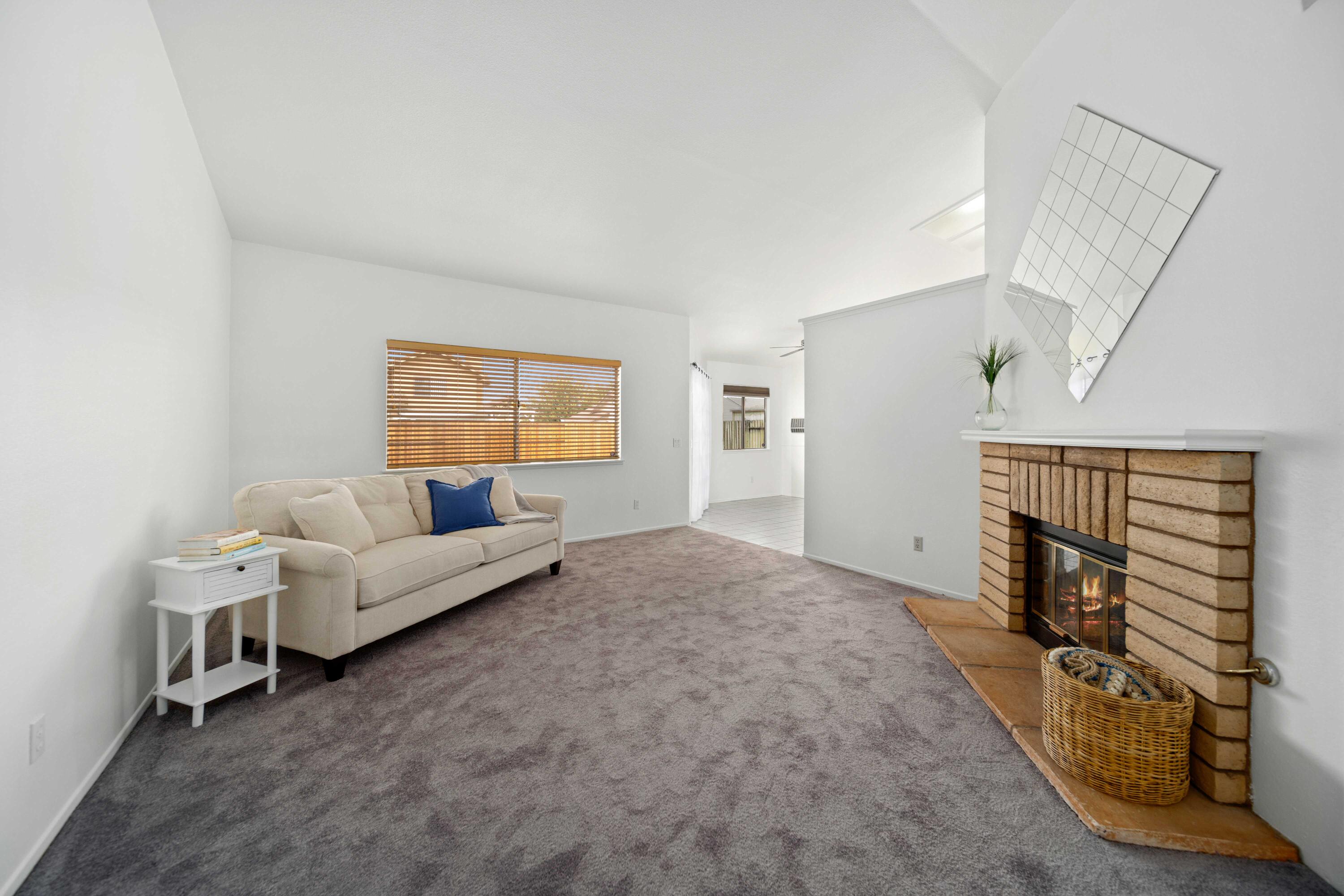 1247 Coventry Place Palmdale, CA 93551 - Photo 4 of 20 a bed room with a bed and a window