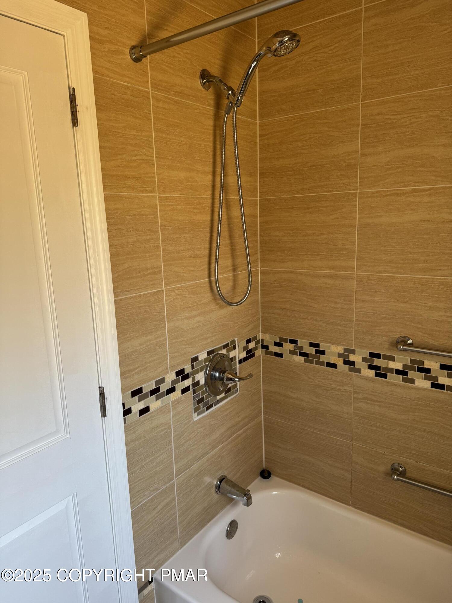 867 Underwood Road West East Stroudsburg, PA 18302 - Photo 26 of 36 a bathroom with a shower and a bath tub