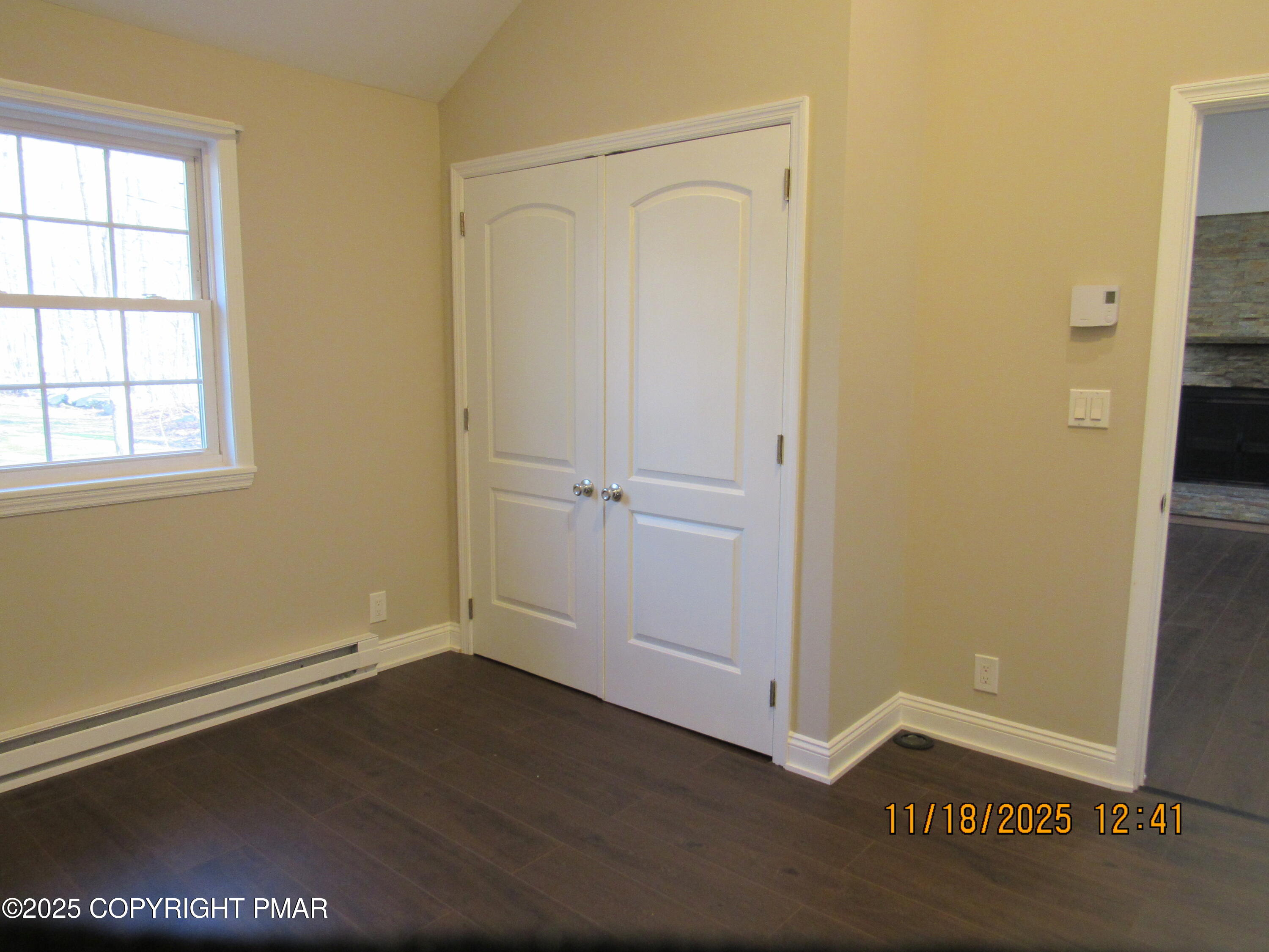 867 Underwood Road West East Stroudsburg, PA 18302 - Photo 31 of 36 an empty room with wooden floor and window
