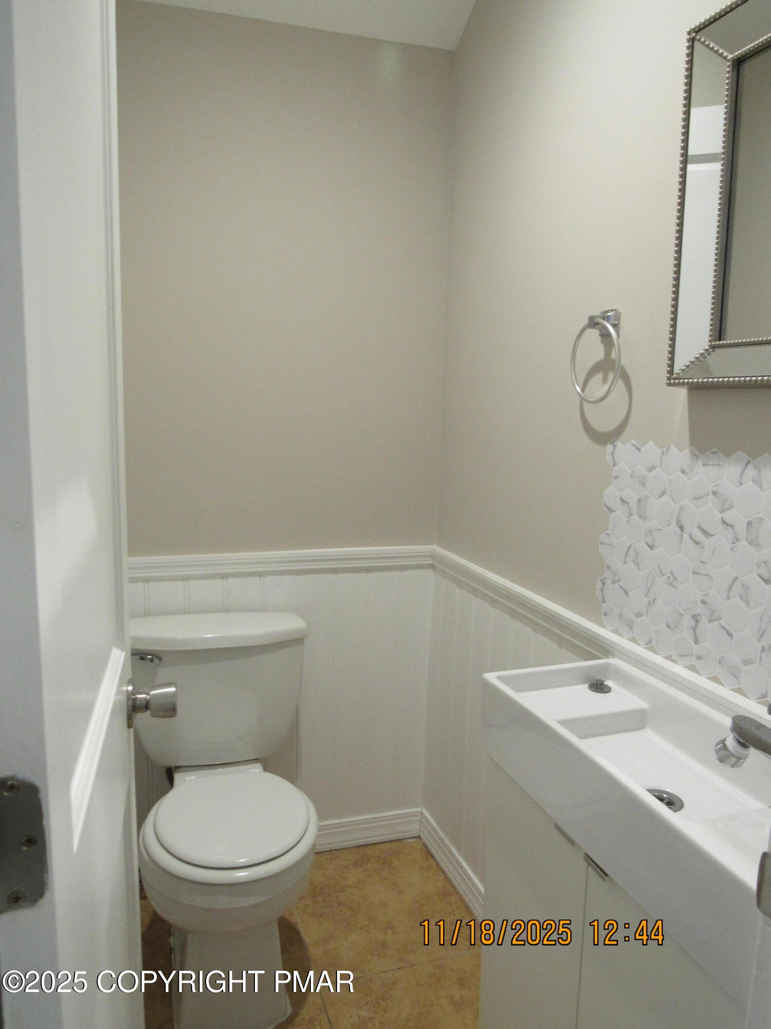 867 Underwood Road West East Stroudsburg, PA 18302 - Photo 34 of 36 a white toilet sitting next to a bathroom sink